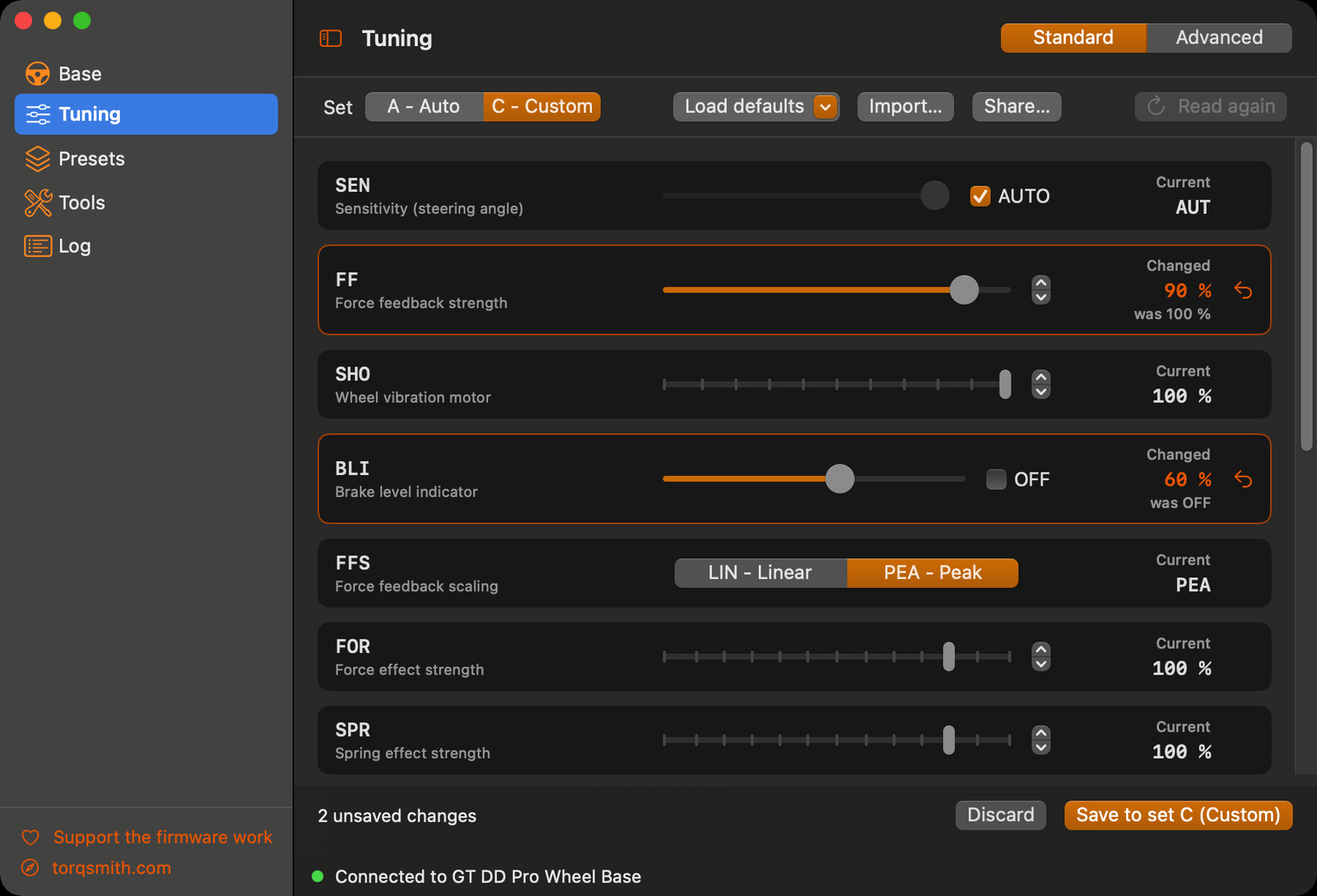 The TorqSmith tuning screen: a list of parameters with sliders, two pending changes shown in orange next to their current values, and a Save bar